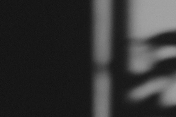 Abstract shape of light in a dark room.